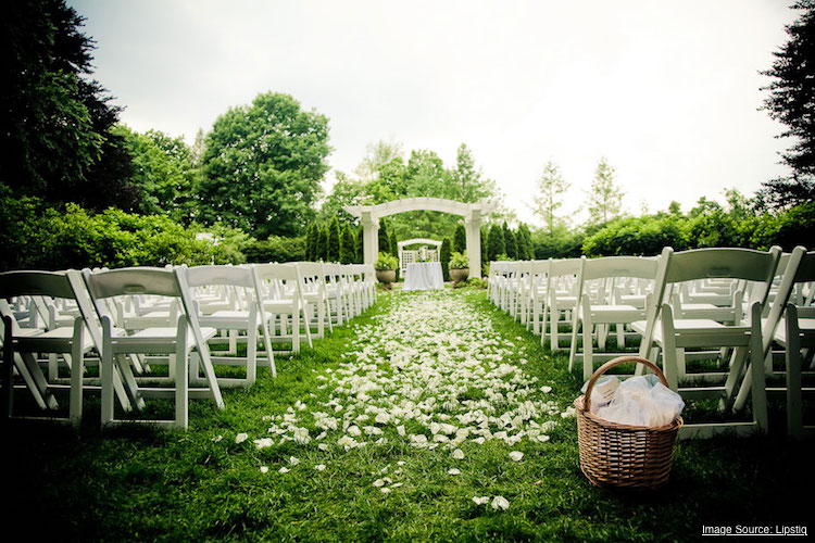 wedding aisle flowers garden ceremony